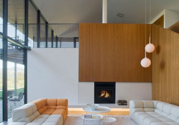 30 Wood Walls Inspirations Walls of Wood in the Living Room with Dark Framed Fireplace and Comfortable Sofa also White Pendant Lamp and Glass Door
