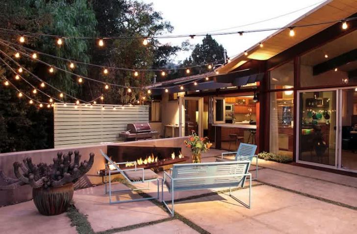 smart patio ideas warm-patio-ideas--with-fire-place-and-string-lights