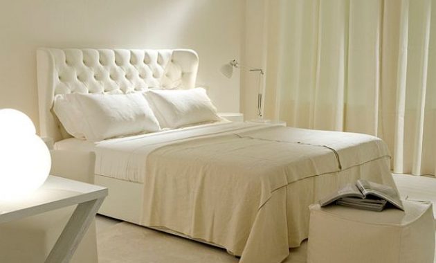 white-tufted-headboard-bedroom-design-with-white-night-stand-and-table-lamp-long-white-curtain
