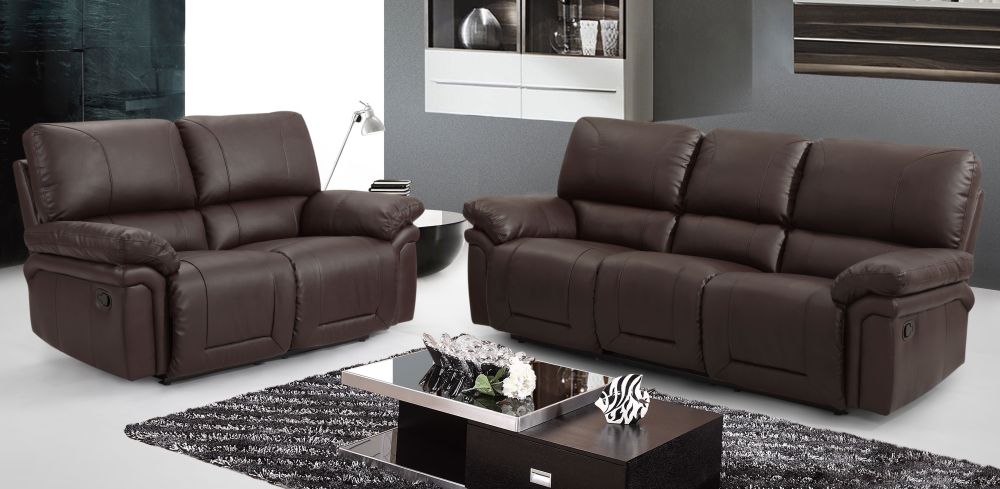dark leather sofa with wooden coffee table and soft rug