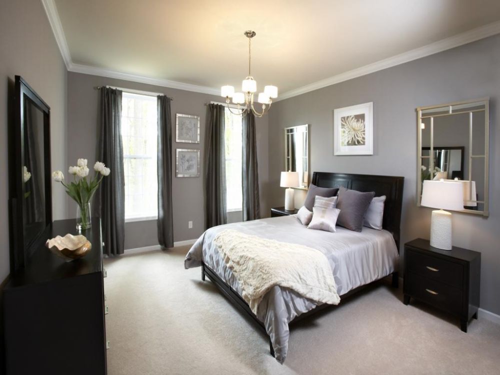 comfort black queen bedroom with smooth light grey wall paint and mini iron chandelier with five glass lampshades