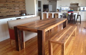 long narrow pallet dining table with wooden bench in dining room