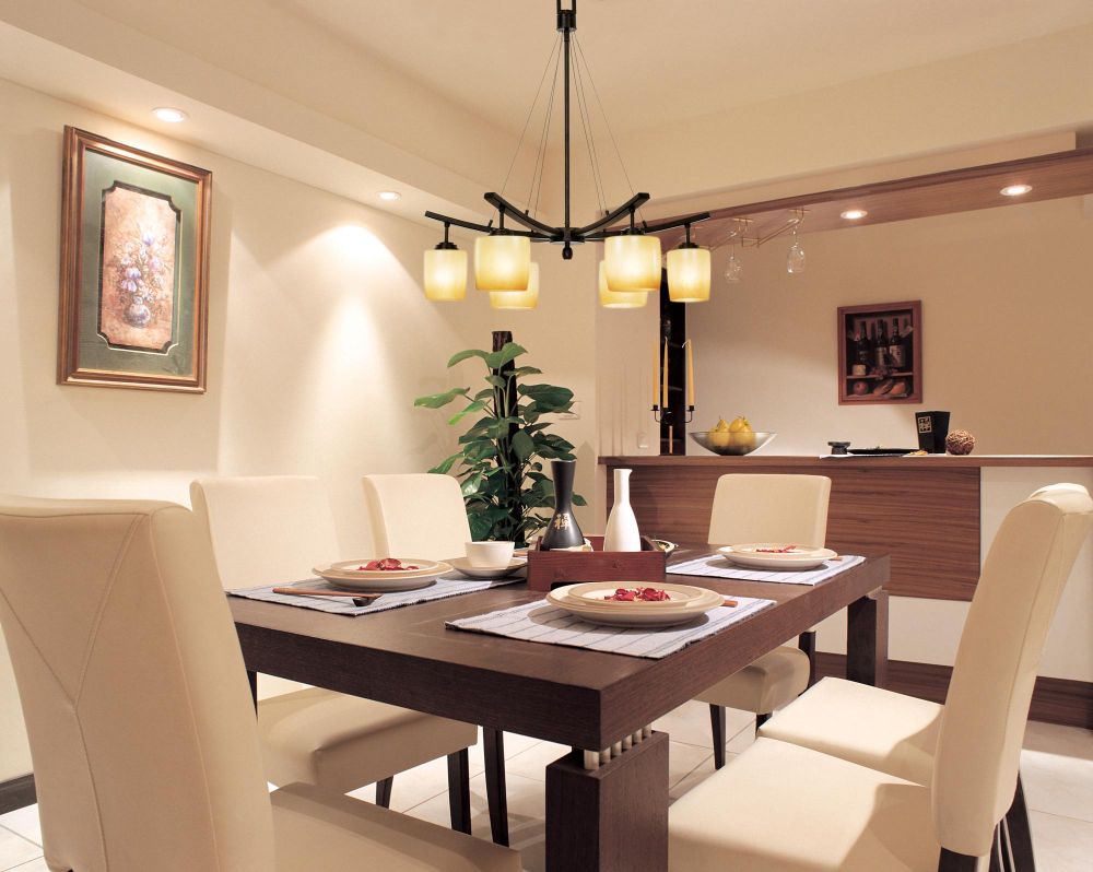 modern hanging light for dining room with wooden table and chairs