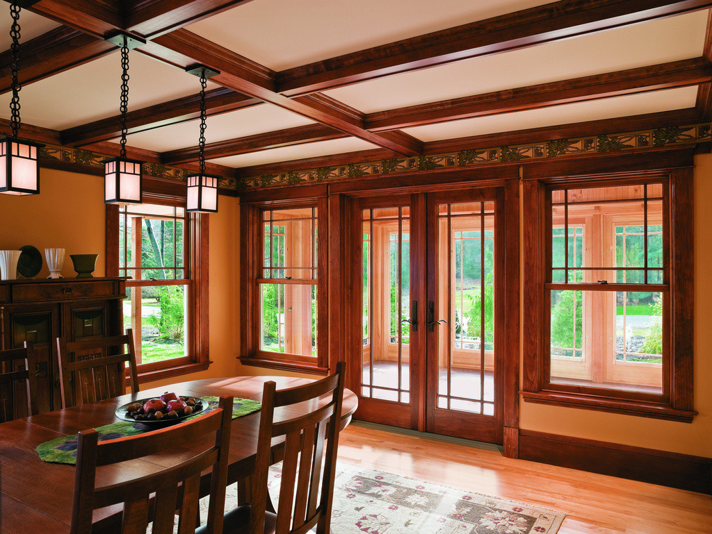 Renovated Dining Room with Renewal By anderson Put Traditional Window Designs and Using Decorative Wood Beams
