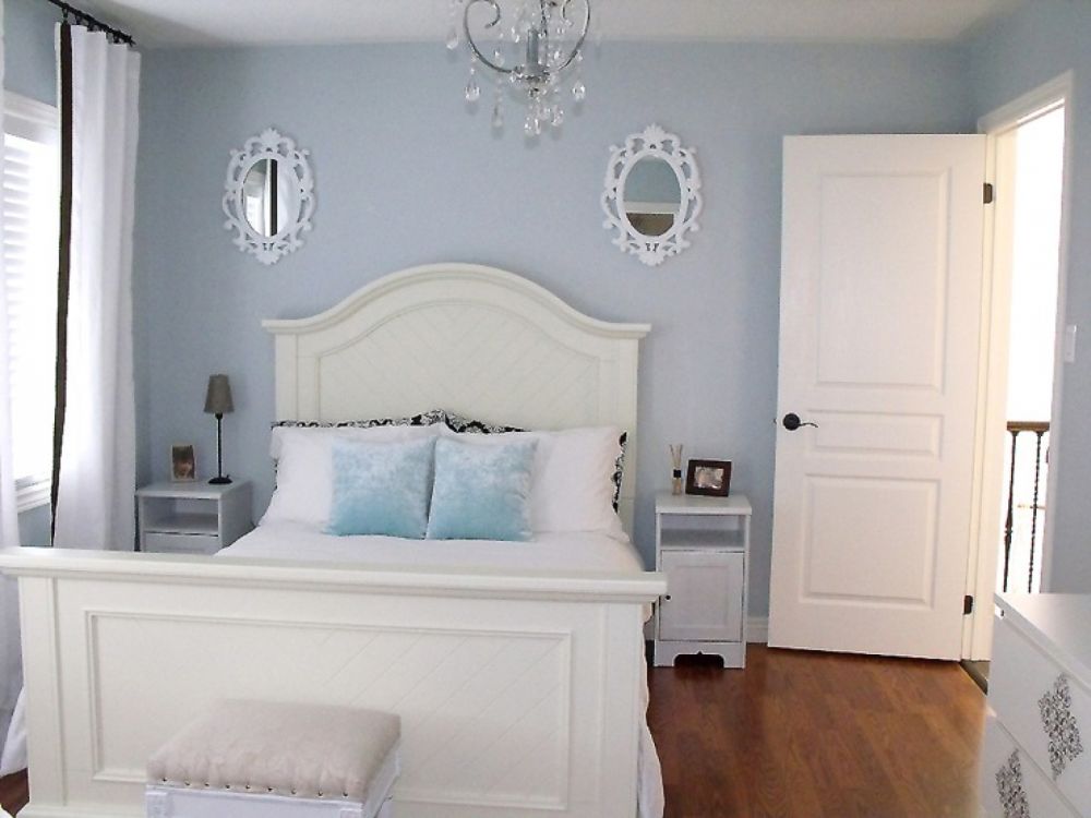 space saving white bedroom design with stylish gray shade wall and white pine bedframe