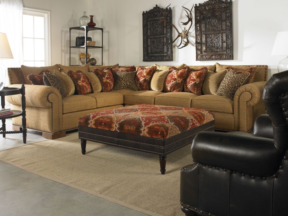 l-shaped brown sofa with floral pattern pillow and atistic wall decoration remarkable sectional sofas inducing elegance and warmth in houston homes