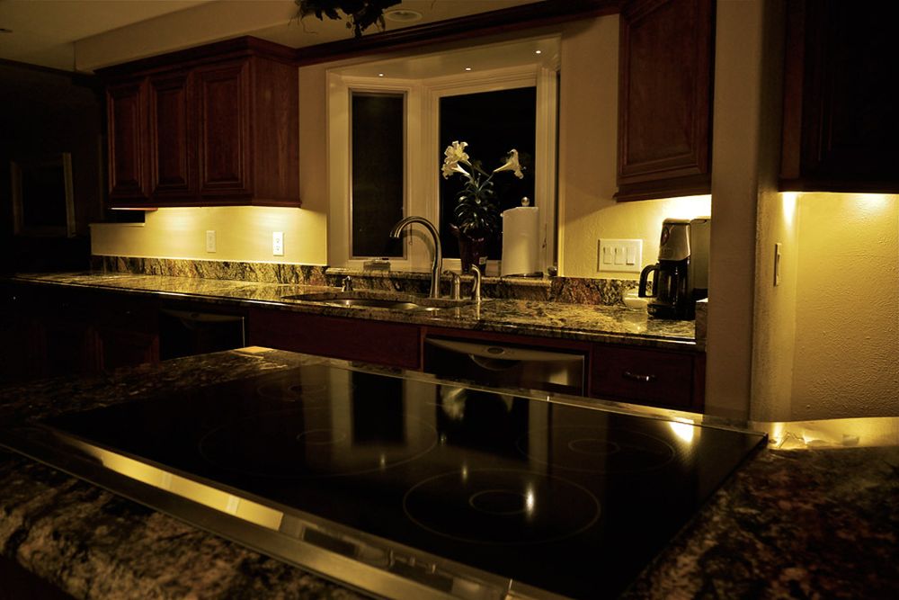 dark kitchen style with the luminous white lights on the brown molding cupboards gives an exotic sense cool under counter lights for spellbind kitchen décor