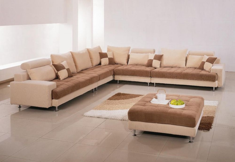 luxurious long creamy sofa design with gradation effect added on the surface presenting best interior design with extra long sofa