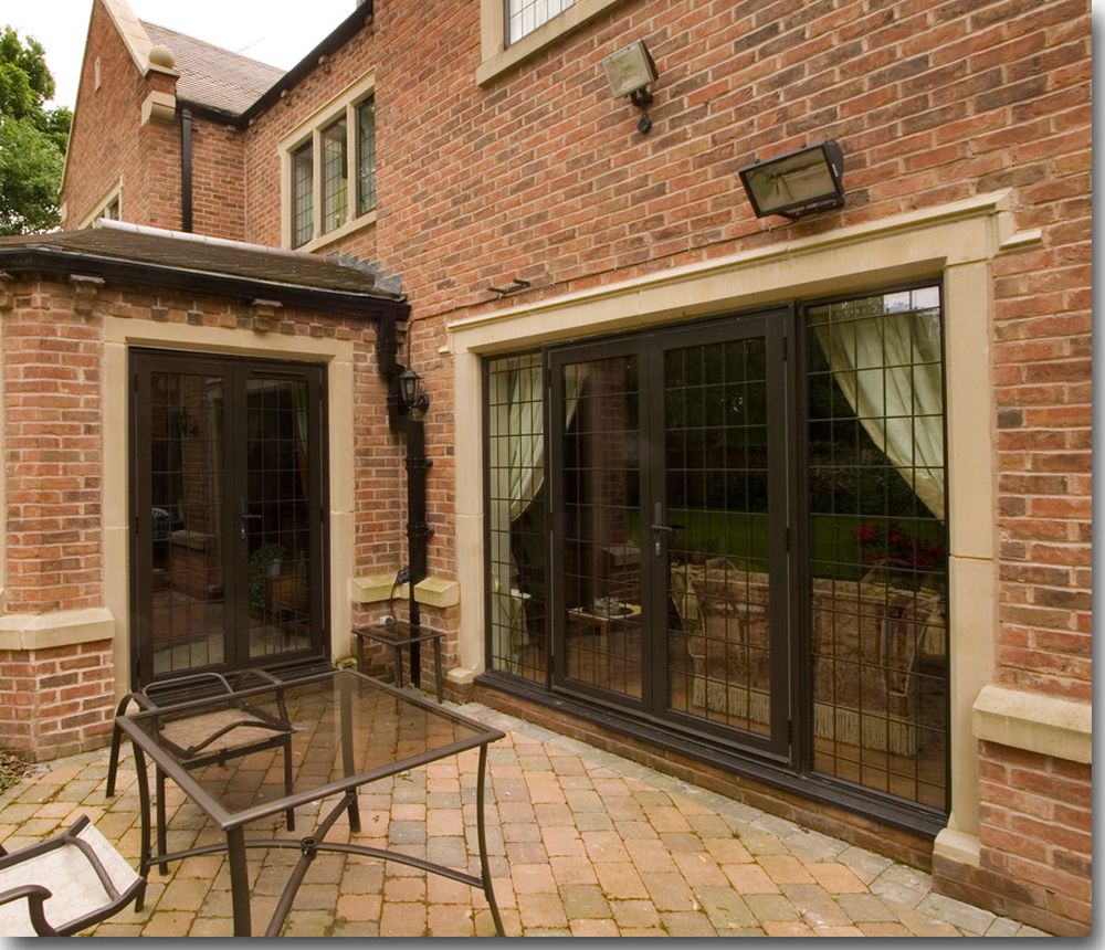 brown brick house with french windows and doors chic window jamb designs giving the perfect atmosphere
