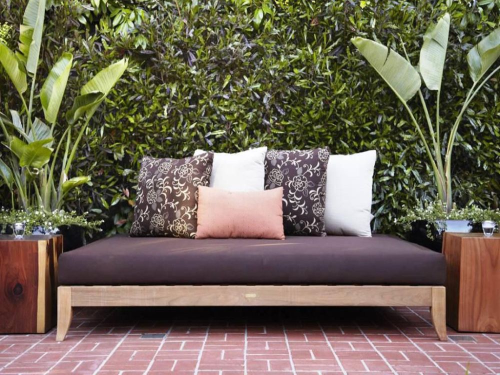 black-outdoor-daybed-mattress-with-floral-pillow-outdoor-daybed-cushion-buying-guide